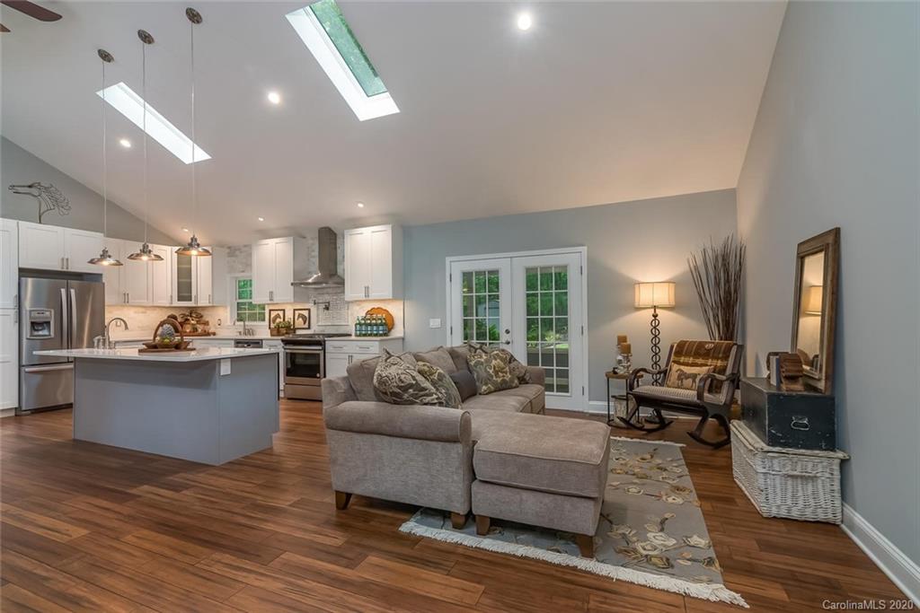 603 Vineyard Road Tryon, NC 28782 - Photo 6 of 39 a living room with furniture and kitchen view
