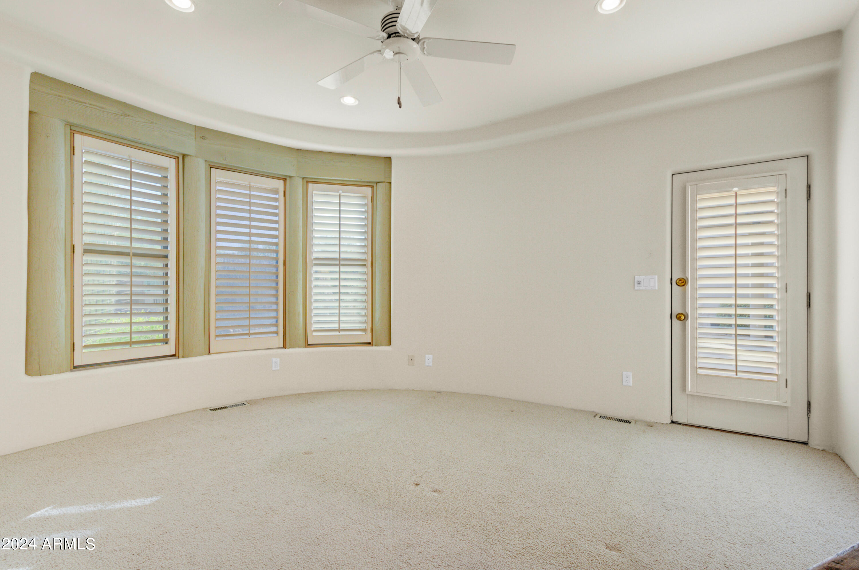 18830 East White Wing Drive Rio Verde, AZ 85263 - Photo 18 of 36 a view of an empty room with a window