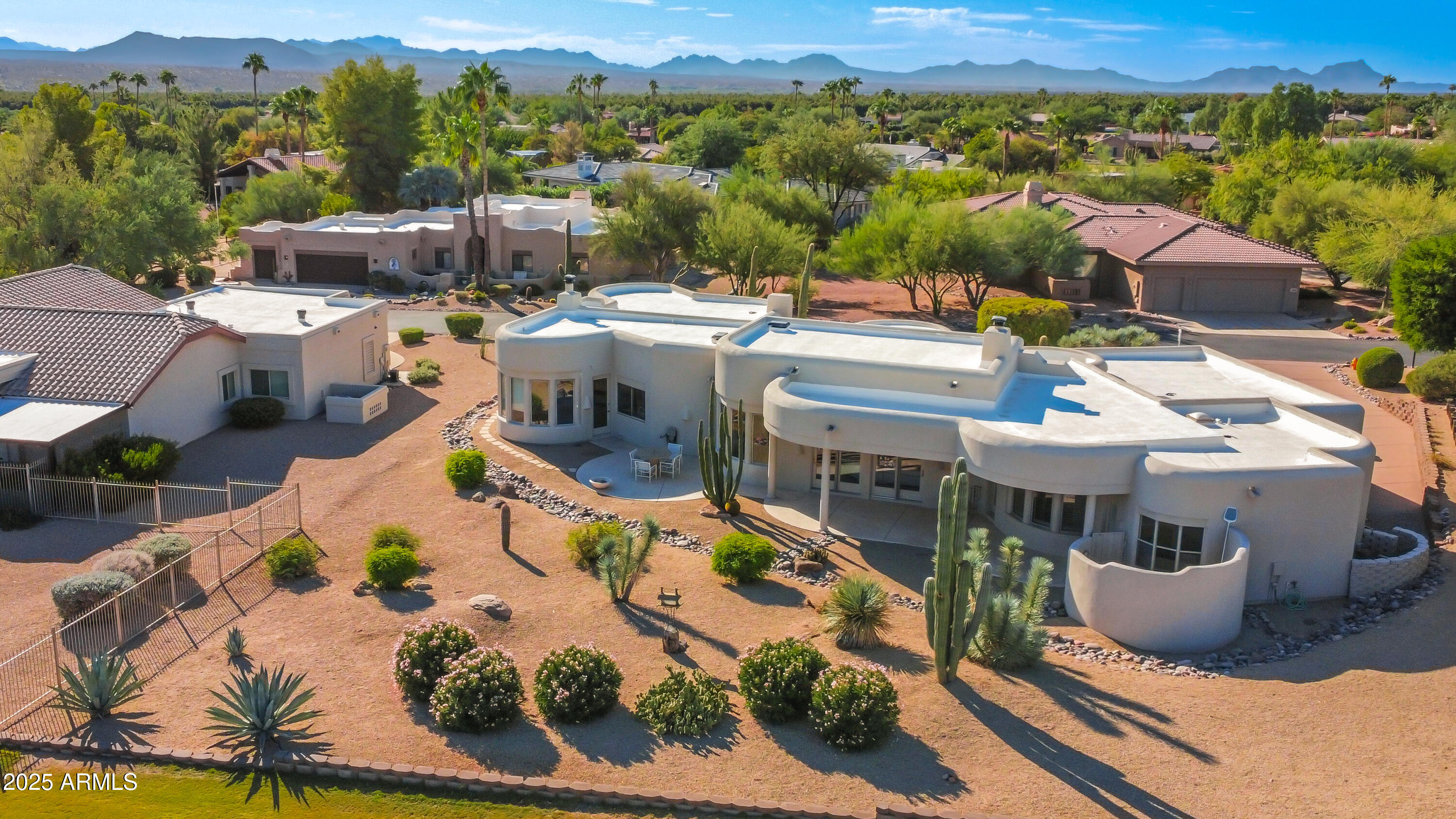 18830 East White Wing Drive Rio Verde, AZ 85263 - Photo 27 of 36 an aerial view of a house with a swimming pool yard and mountain view