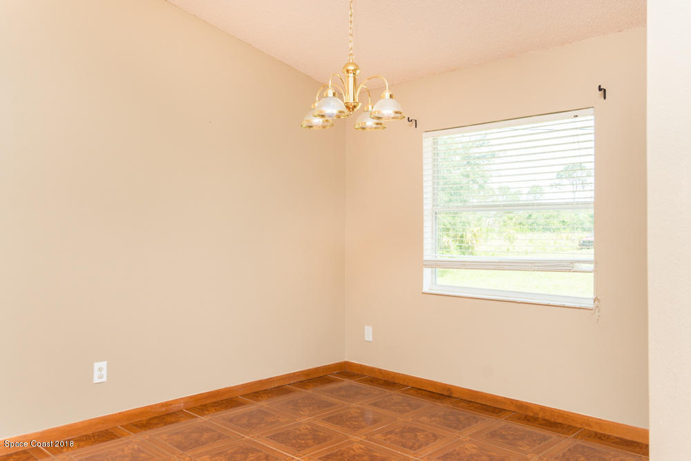 573 Titan Road Southeast Palm Bay, FL 32909 - Photo 4 of 16 medium-2