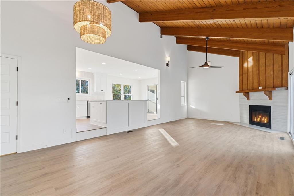3447 Dry Creek Road Marietta, GA 30062 - Photo 13 of 42 a view of an empty room with a fireplace and window