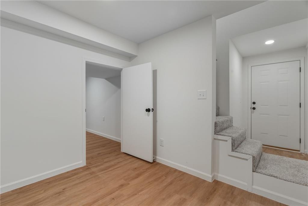 3447 Dry Creek Road Marietta, GA 30062 - Photo 32 of 42 wooden floor in an empty room
