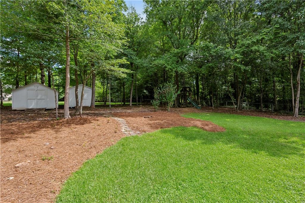 3447 Dry Creek Road Marietta, GA 30062 - Photo 39 of 42 a view of a tree with a backyard