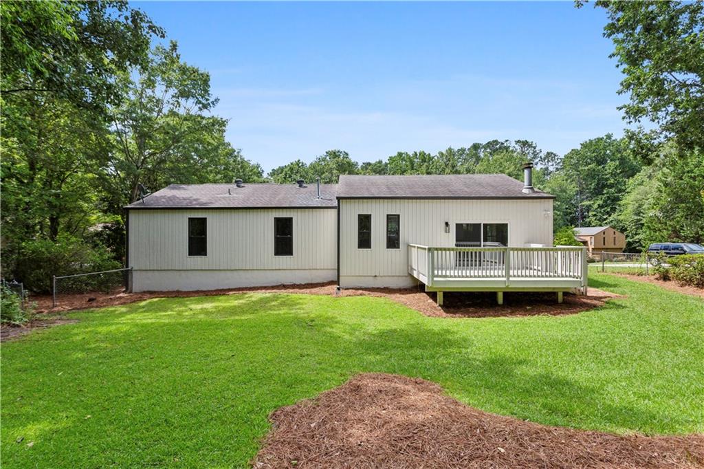 3447 Dry Creek Road Marietta, GA 30062 - Photo 40 of 42 a front view of a house with a garden