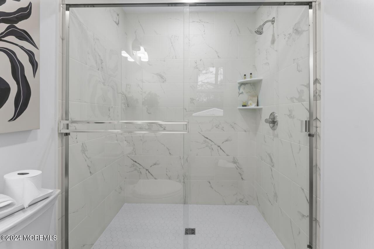 13 Texas Road Matawan, NJ 07747 - Photo 18 of 38 a bathroom with a shower