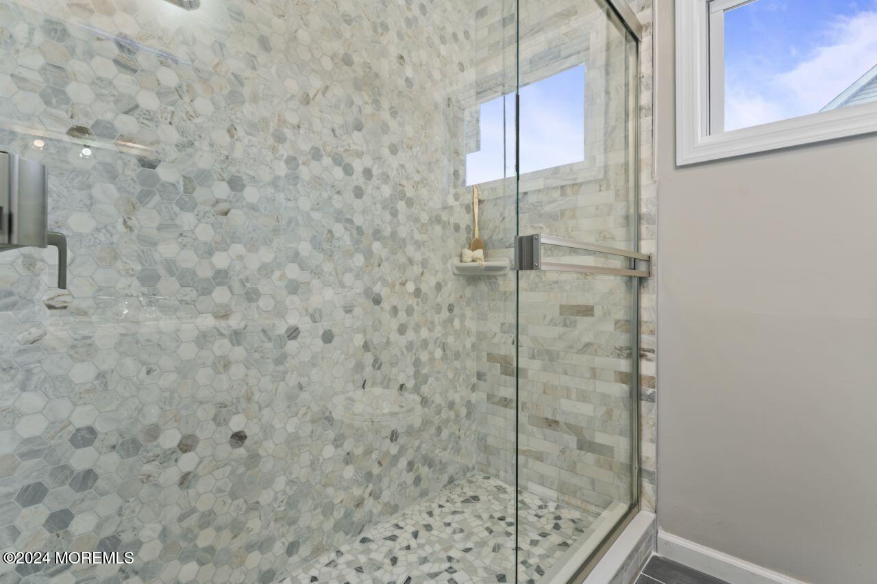 13 Texas Road Matawan, NJ 07747 - Photo 27 of 38 a bathroom with a shower