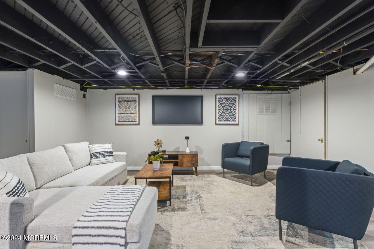 13 Texas Road Matawan, NJ 07747 - Photo 28 of 38 a living room with furniture and a view of flowerpot