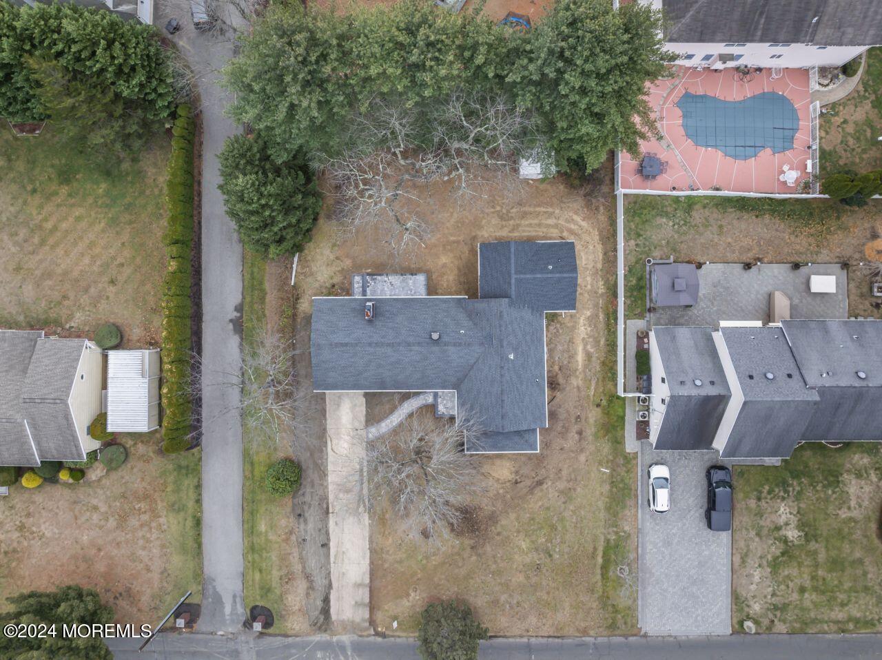 13 Texas Road Matawan, NJ 07747 - Photo 33 of 38 an aerial view of residential houses with outdoor space