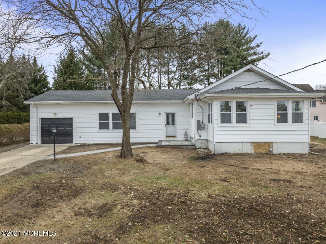 13 Texas Road Matawan, NJ 07747 - Photo 35 of 38 a view of a house with a yard