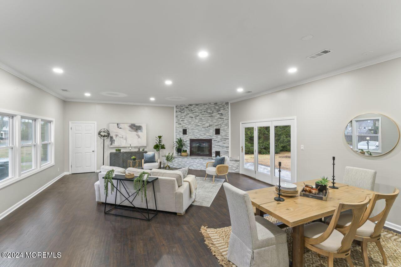 13 Texas Road Matawan, NJ 07747 - Photo 5 of 38 a living room with fireplace furniture and a large window