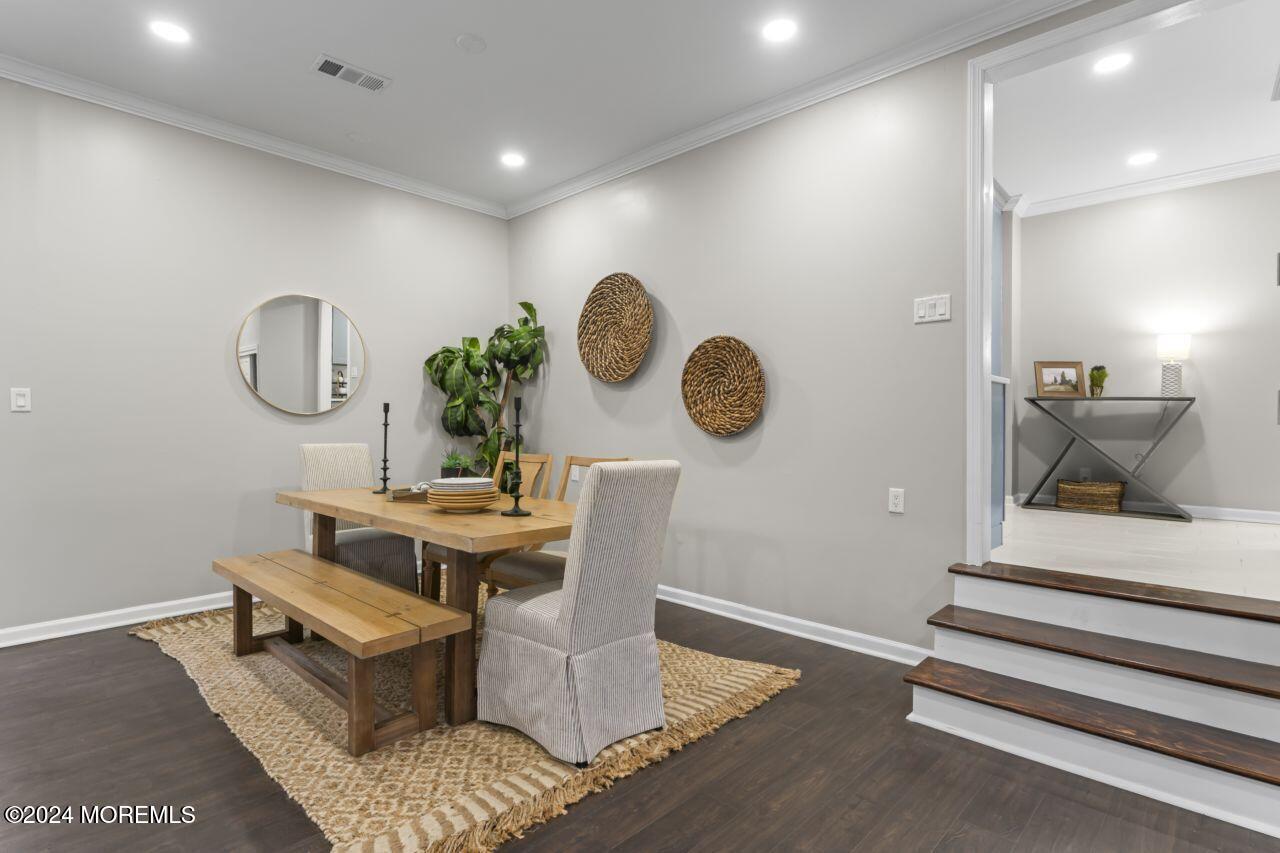 13 Texas Road Matawan, NJ 07747 - Photo 7 of 38 a living room with furniture and a mirror