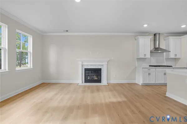 a kitchen with a stove and a sink
