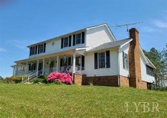 1700 Thorntons Mill Road Red House, VA 23963 - Photo 1 of 23 a front view of house with yard