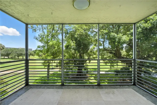 a close up of a bench in a balcony