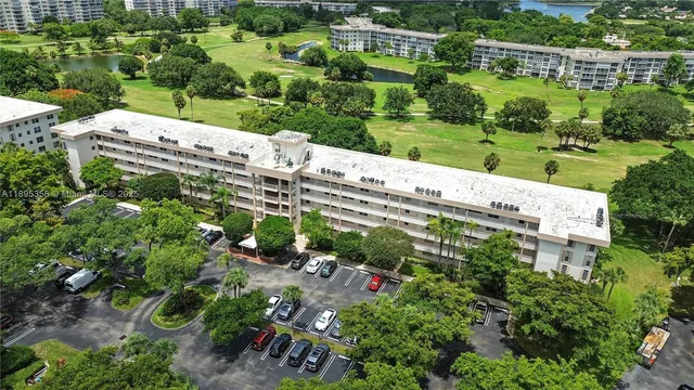 a view of a garden with plants and lake view