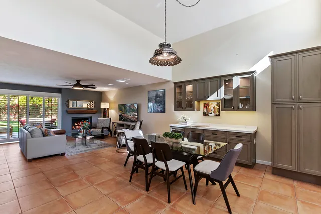 a view of a dining room with furniture window and outside view