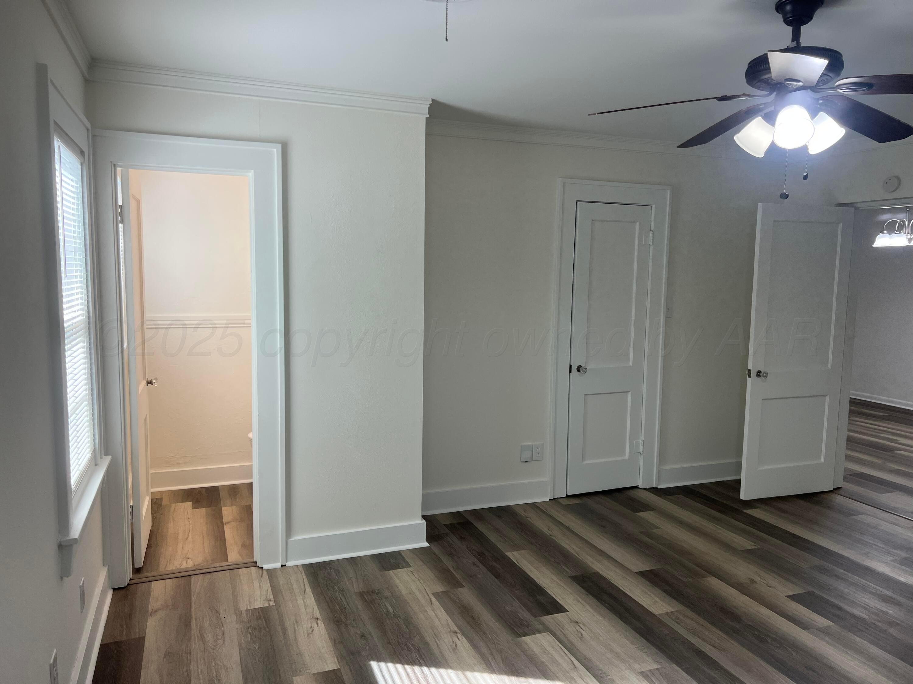 4233 Southwest 13th Avenue Amarillo, TX 79106 - Photo 13 of 55 a view of a livingroom with wooden floor