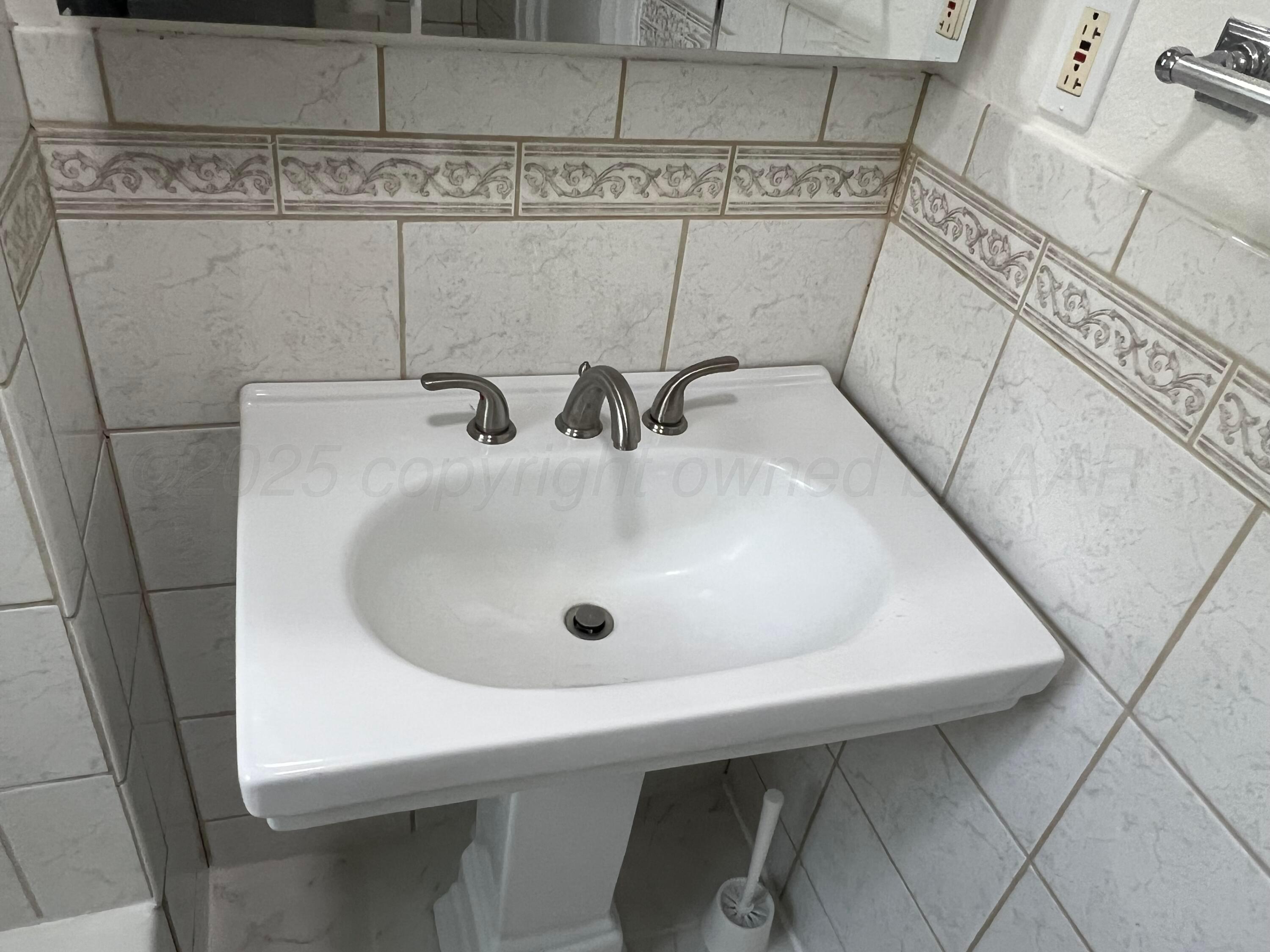 4233 Southwest 13th Avenue Amarillo, TX 79106 - Photo 24 of 55 a close view of sink and tap