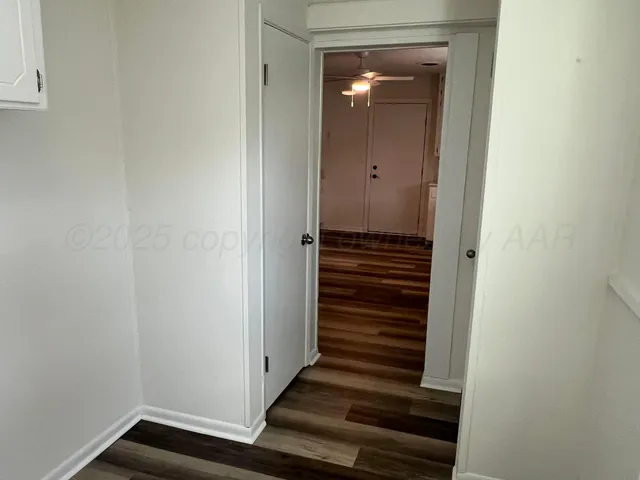 a storage room with an empty shelf