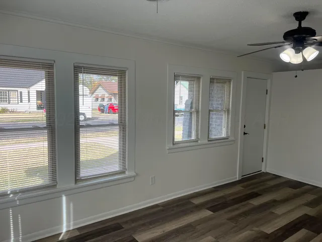 a view of an empty room and window