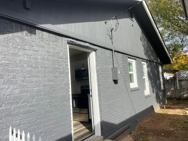 a view of swimming pool with patio