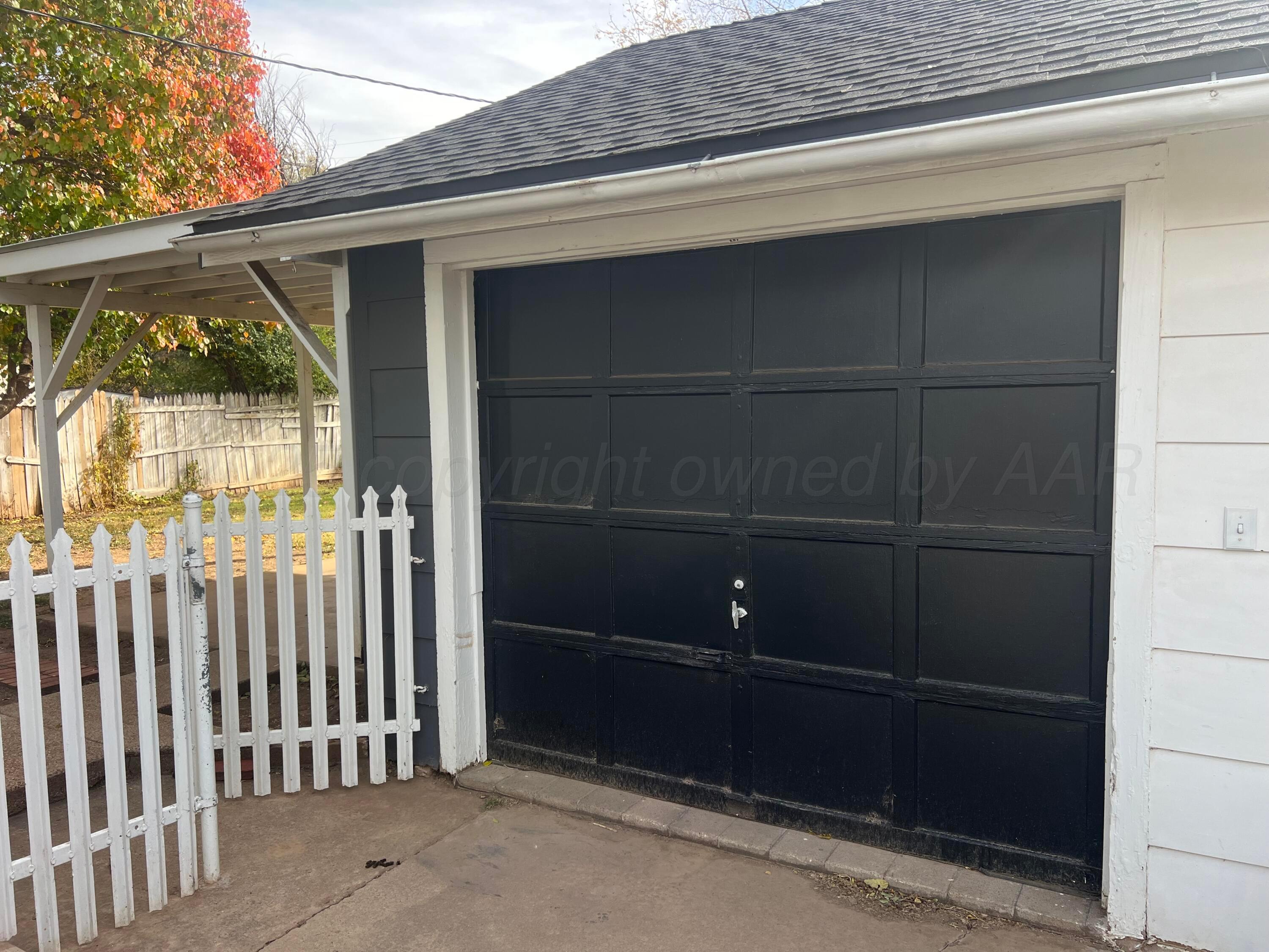 4233 Southwest 13th Avenue Amarillo, TX 79106 - Photo 47 of 55 a view of a house with a door and wooden floor
