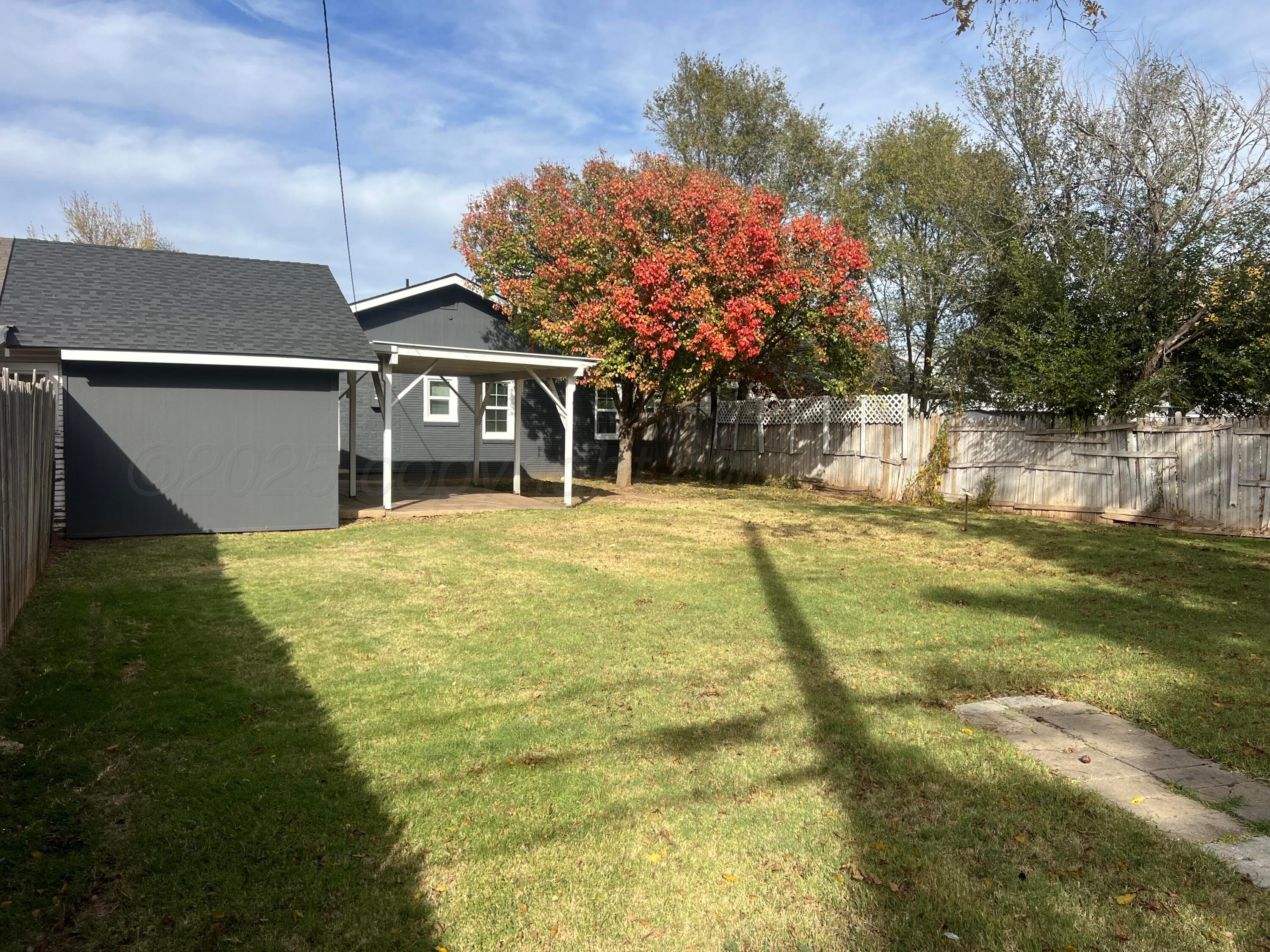 4233 Southwest 13th Avenue Amarillo, TX 79106 - Photo 51 of 55 a view of a house with a yard