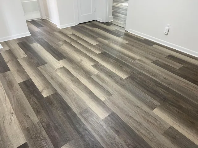 a view of backyard with wooden floor