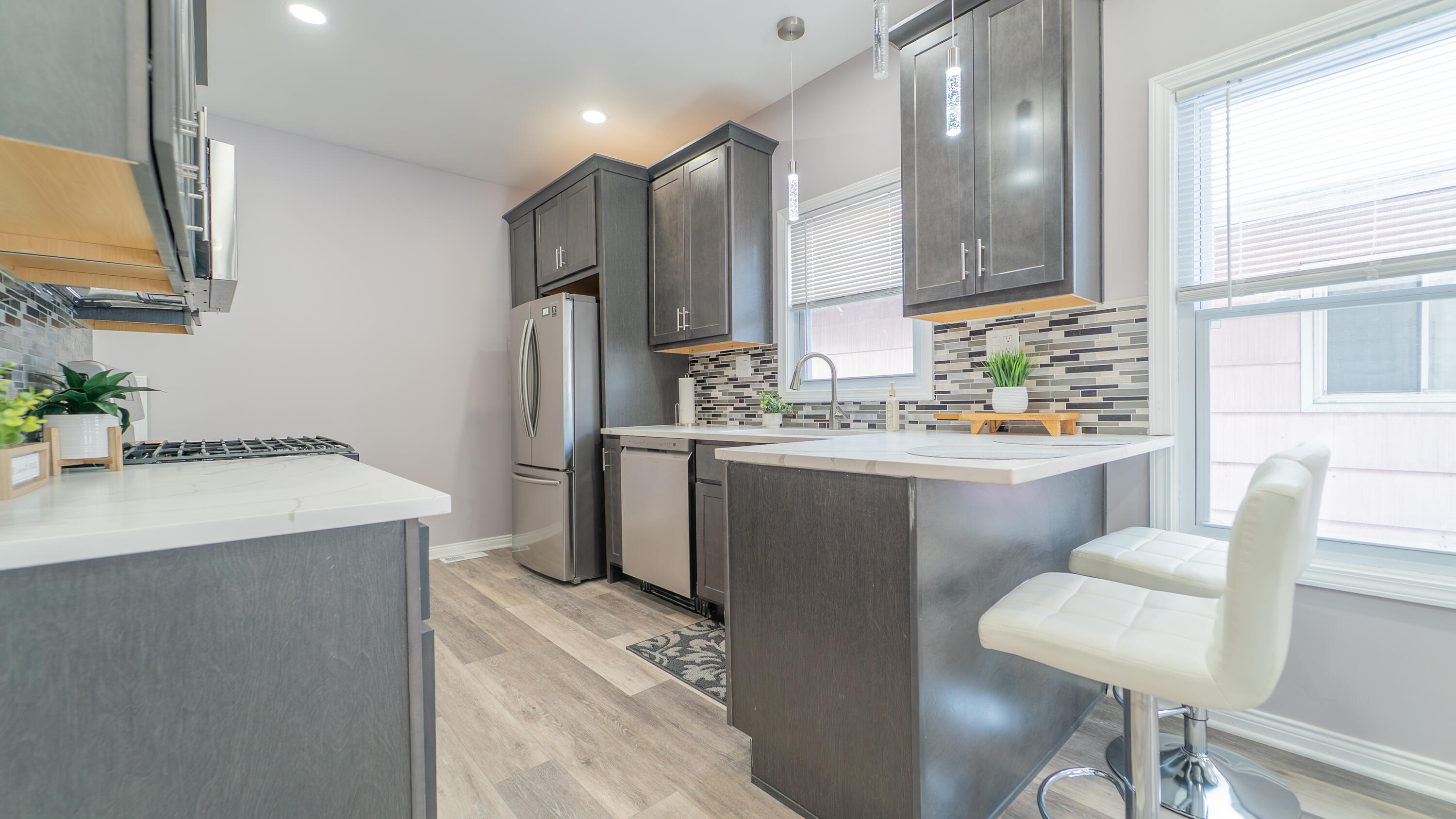 4044 Louisiana Street Gary, IN 46409 - Photo 7 of 31 a kitchen with a sink appliances and cabinets