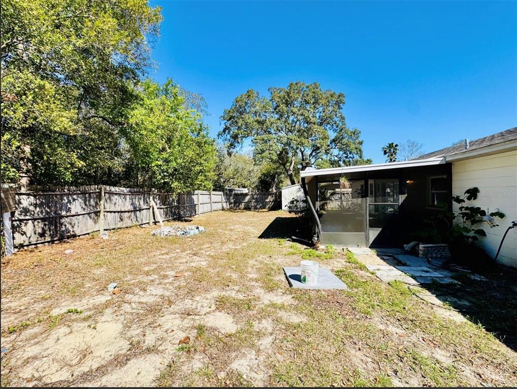 7423 Mohawk Trail Spring Hill, FL 34606 - Photo 3 of 20 a view of back yard of the house
