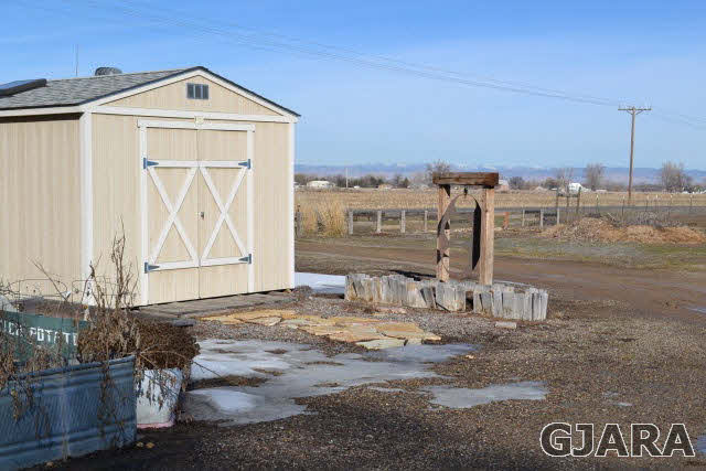 1002 19 Road Fruita, CO 81521 - Photo 2 of 8 a view of a house with a outdoor space