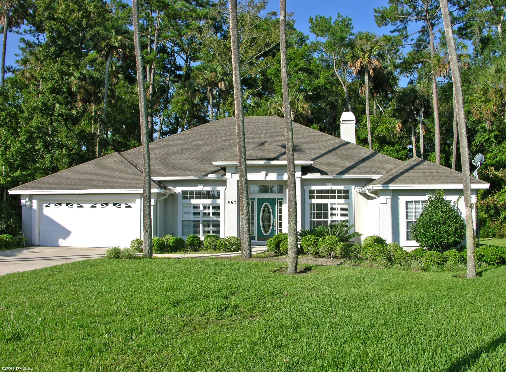 465 Big Tree Road Ponte Vedra, FL 32082 - Photo 1 of 12 a view of a white house with a big yard and potted plants