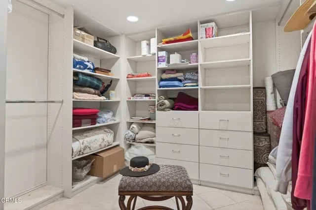 a view of a hallway with seating area