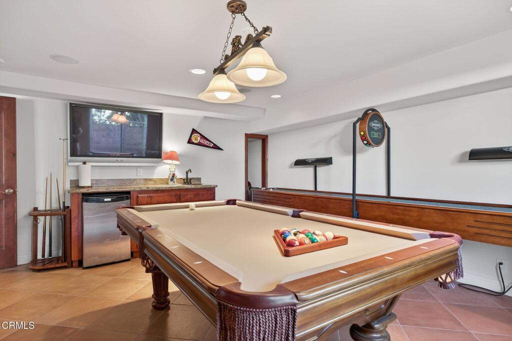 2408 Ocean Drive Oxnard, CA 93035 - Photo 39 of 58 a room with pool table and windows