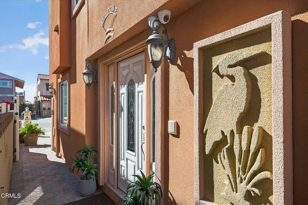 a view of a house with a door and a window