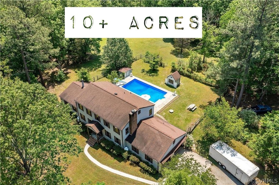 Over 3,000 square foot home with in-ground pool and plenty of privacy and space.