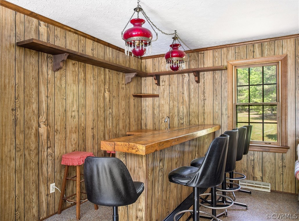 22601 Skinquarter Road Moseley, VA 23120 - Photo 23 of 50 a view of a dining room with furniture and a window