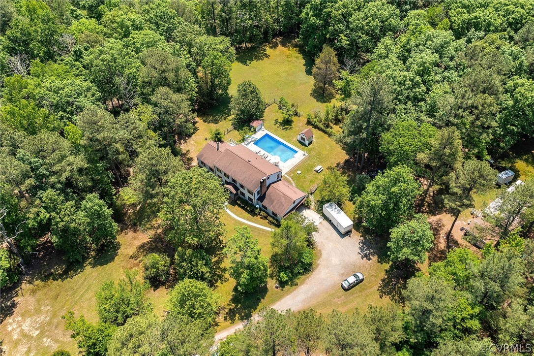 22601 Skinquarter Road Moseley, VA 23120 - Photo 39 of 50 an aerial view of a house with a yard and lake view