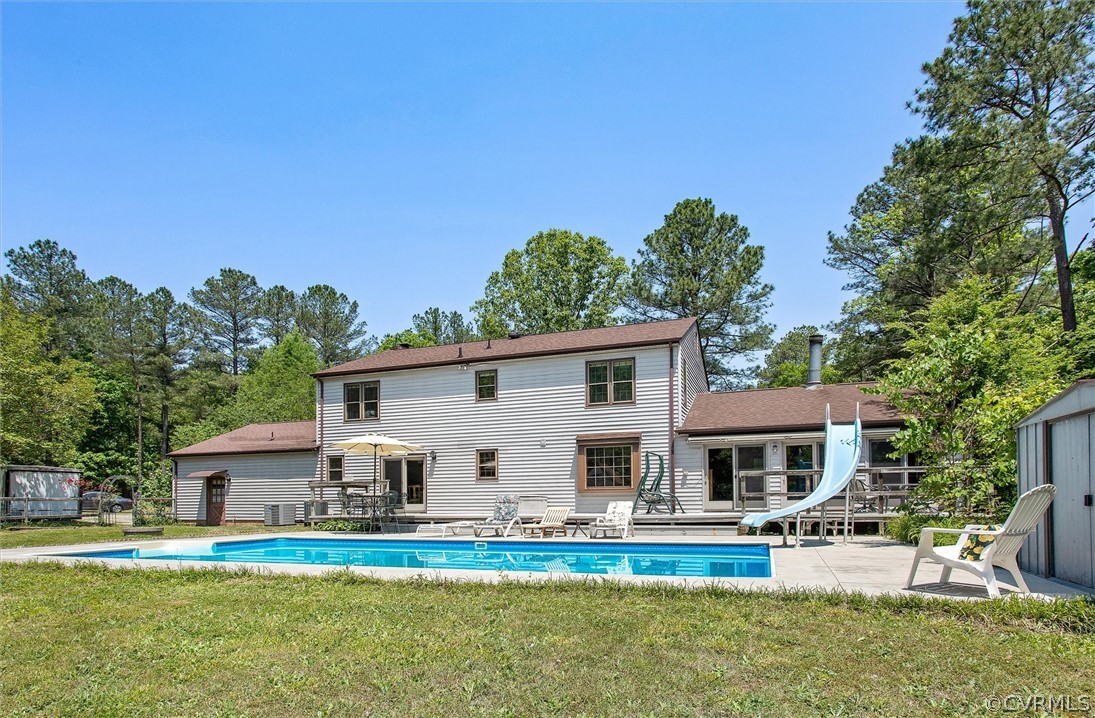 22601 Skinquarter Road Moseley, VA 23120 - Photo 5 of 50 a front view of house with yard and outdoor seating