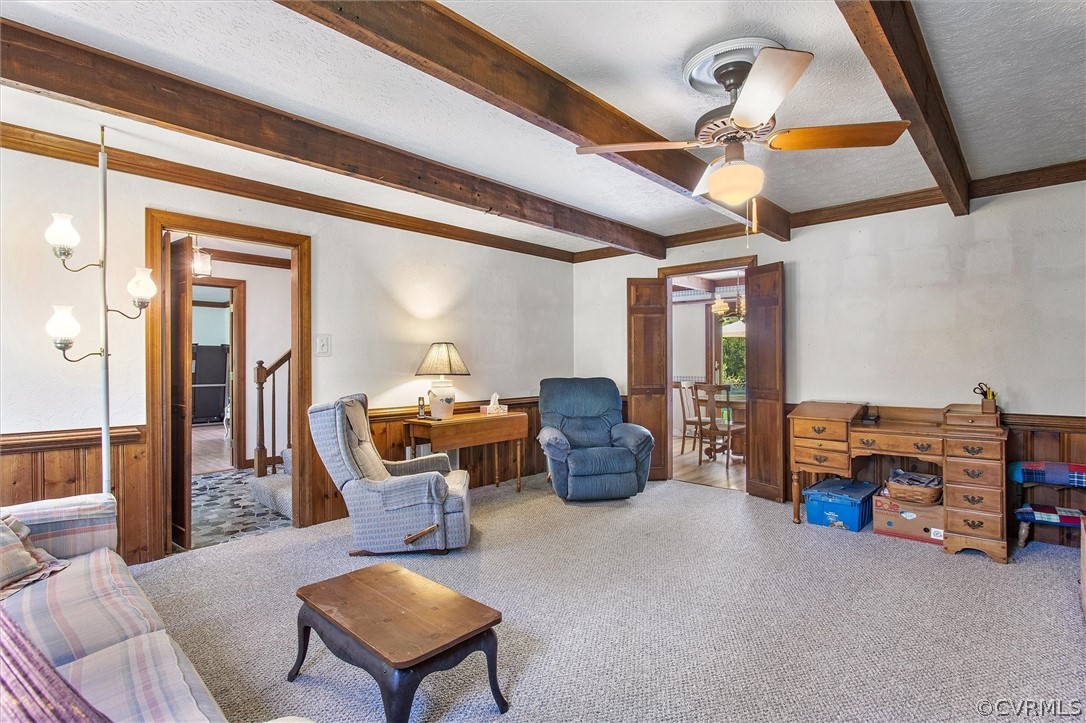22601 Skinquarter Road Moseley, VA 23120 - Photo 10 of 50 a living room with furniture a rug and a ceiling fan
