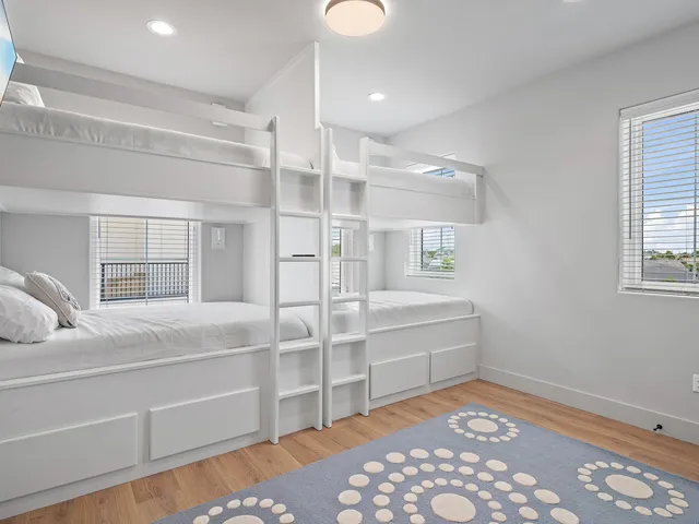 a room with a bed and a window