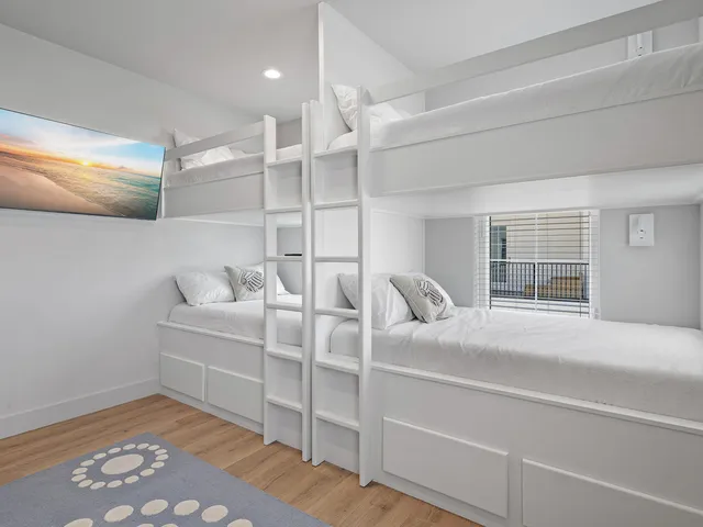 a room with a bed and a window