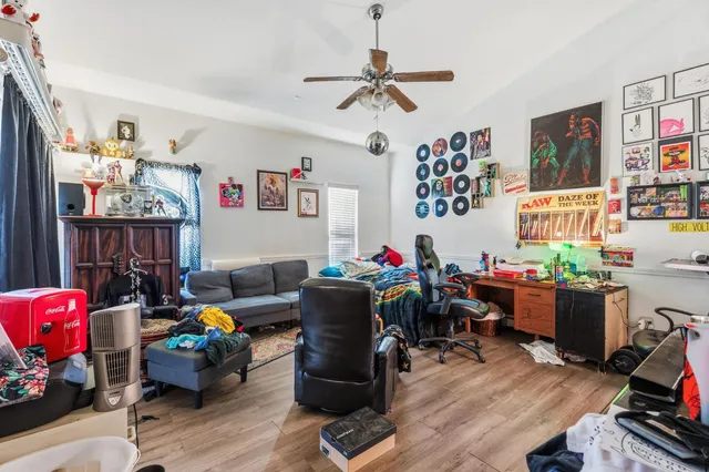 a view of an empty room and a window