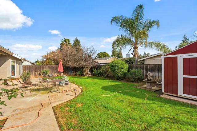 a front view of a house with yard