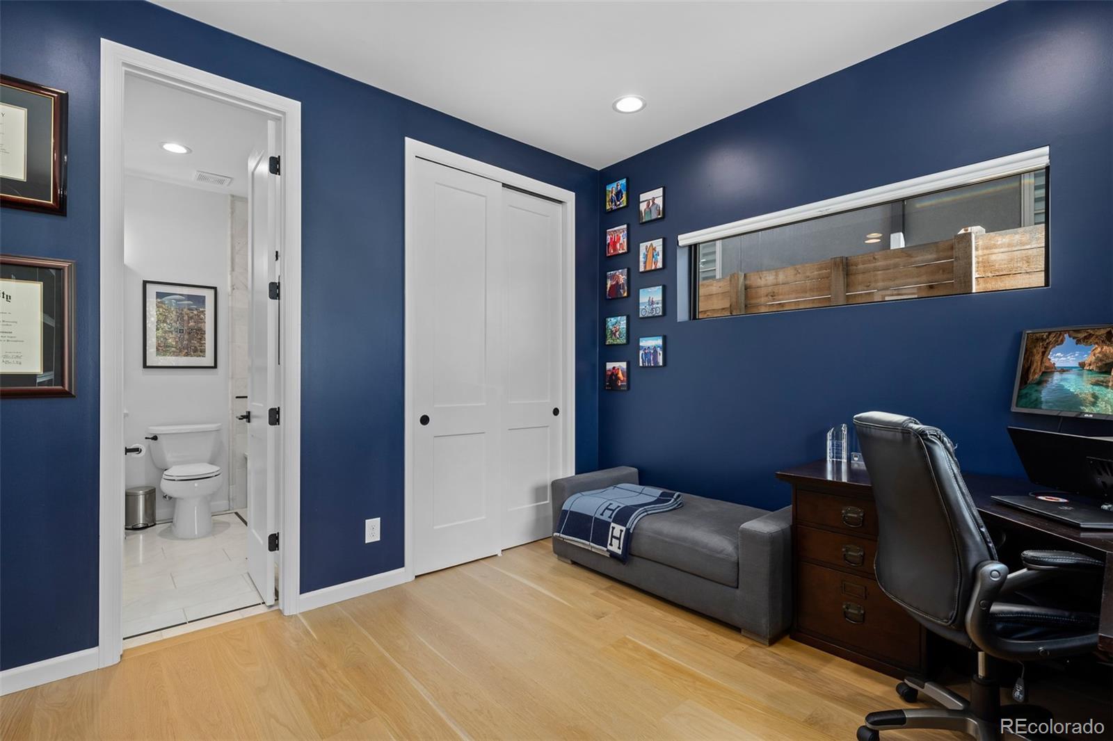 3451 Quivas Street Denver, CO 80211 - Photo 20 of 50 a bedroom with furniture and a piano