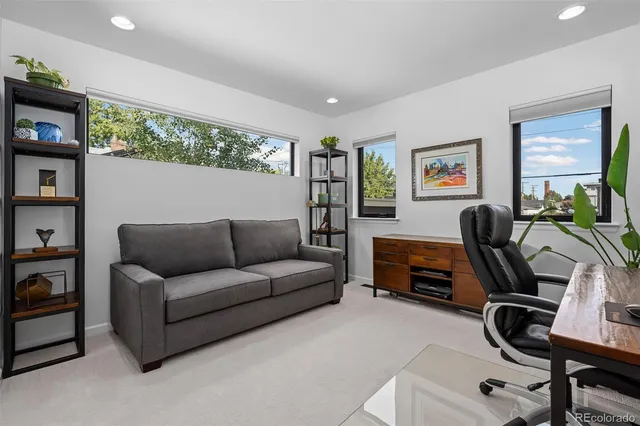 a view of a patio with furniture