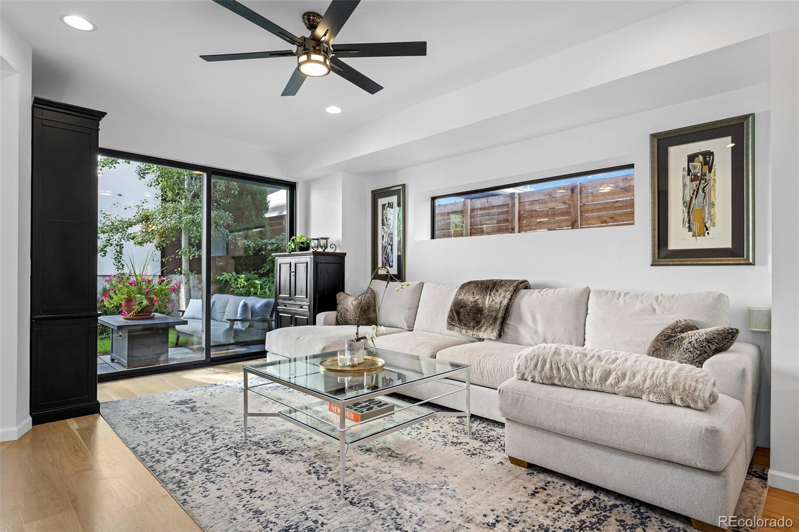 3451 Quivas Street Denver, CO 80211 - Photo 8 of 50 a living room with furniture and a rug