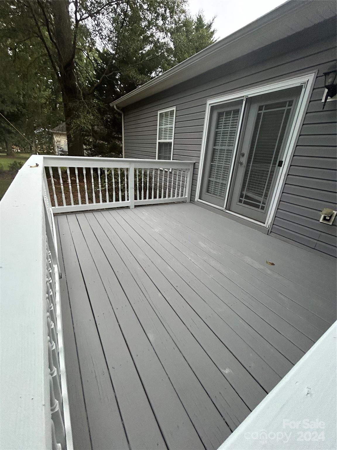 993 West Shiloh Unity Road Lancaster, SC 29720 - Photo 17 of 26 a view of backyard with deck and wooden floor