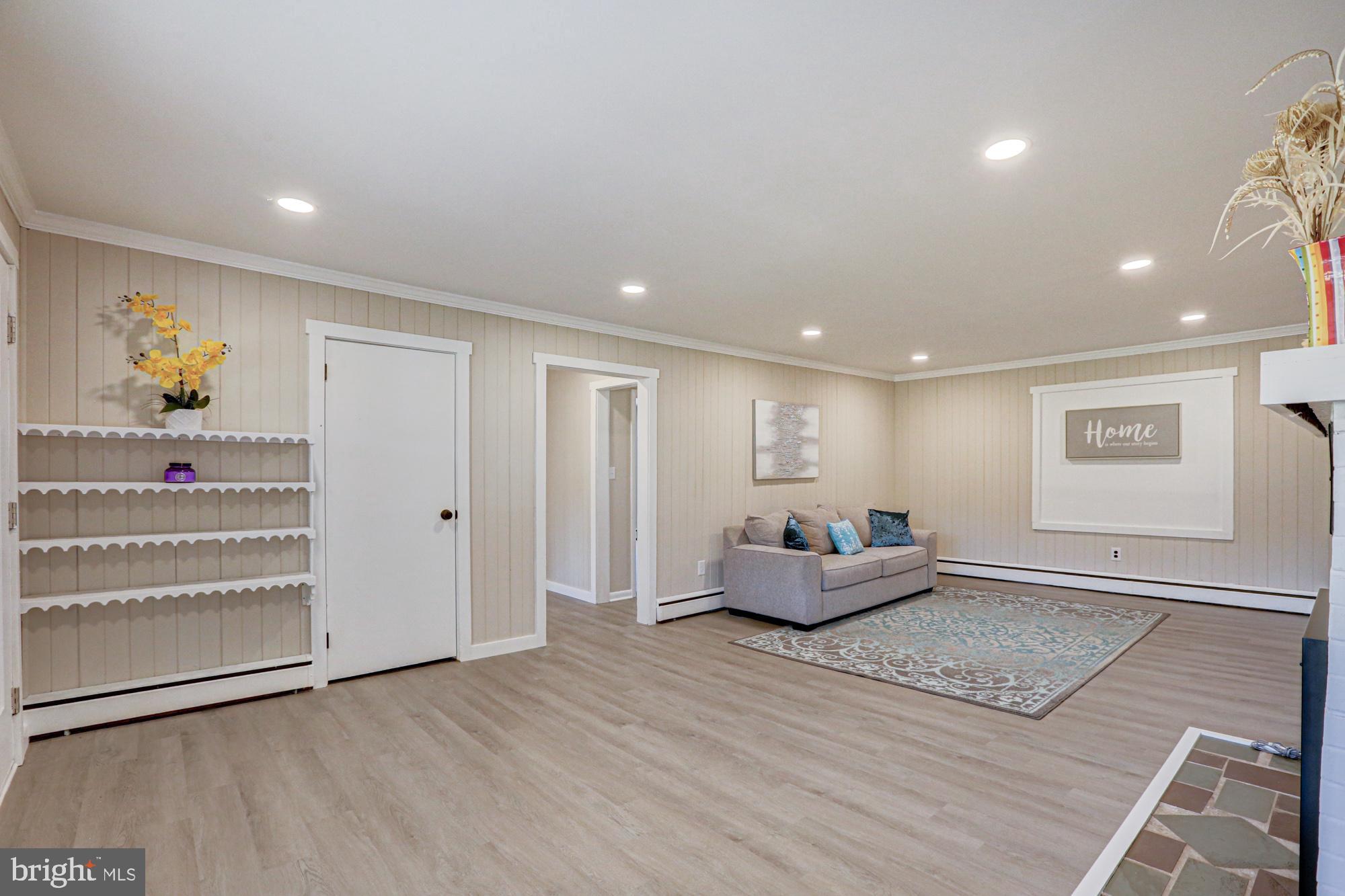 4841 Sandtown Road Felton, DE 19943 - Photo 11 of 70 a living room with furniture and wooden floor