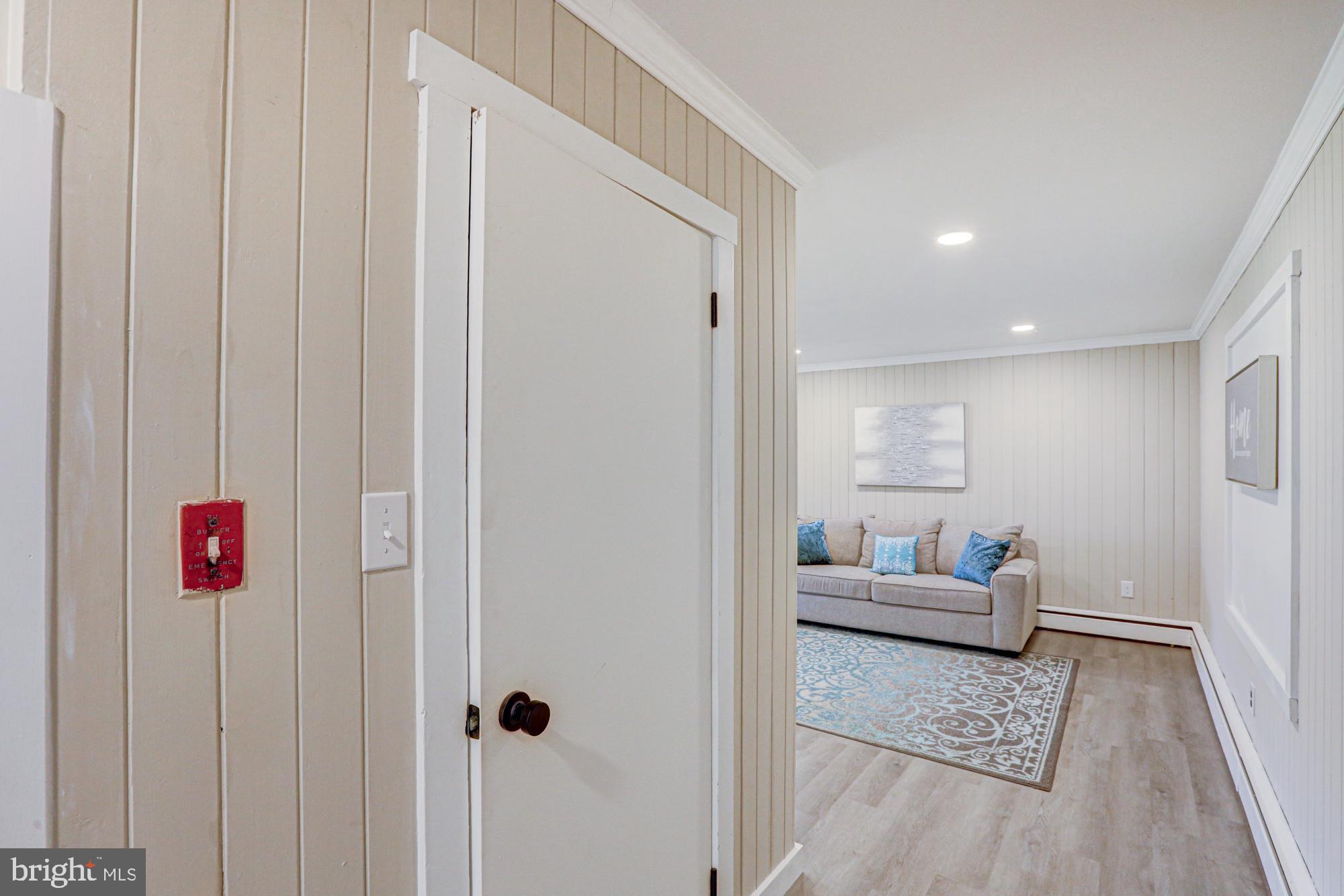 4841 Sandtown Road Felton, DE 19943 - Photo 25 of 70 a living room with furniture and a wooden floor